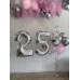 Ασημί νούμερα με ελεύθερα μπαλόνια